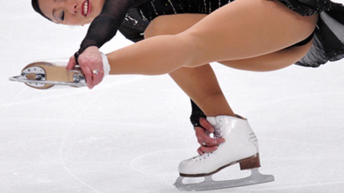 Japanese Miki Ando claims gold at figure skating worlds