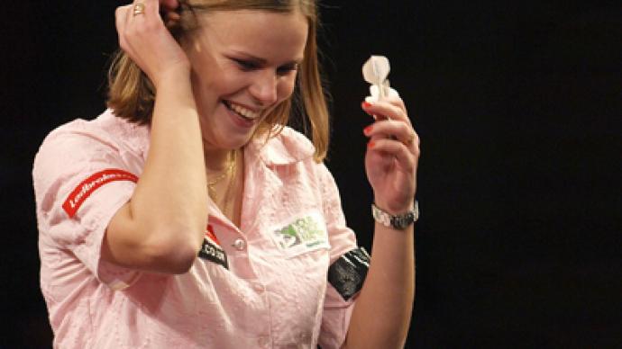 Russian defends darts world crown