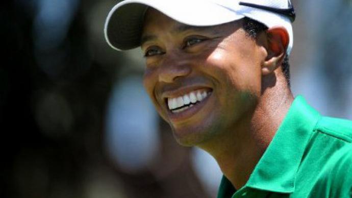 Woods helps Americans raise Presidents Cup