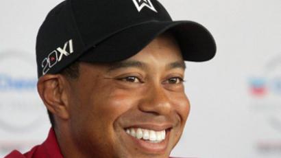 Woods helps Americans raise Presidents Cup