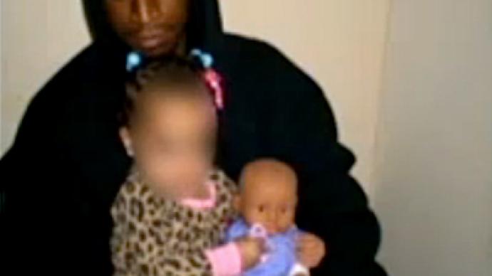 Man arrested for posing with baby and BB gun on Facebook photo