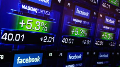 Facebook soars to record high, hits $60 per share for first time