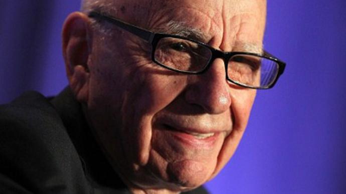 Murdoch gets a Twitter - and his wife is already mad at him