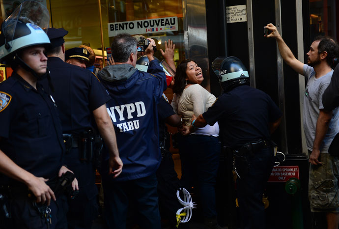A participant in Occupy Wall Street protest is arrested by police during a rally to mark the one year anniversary of the movement in New York.(AFP Photo / Emmanuel Dunand )