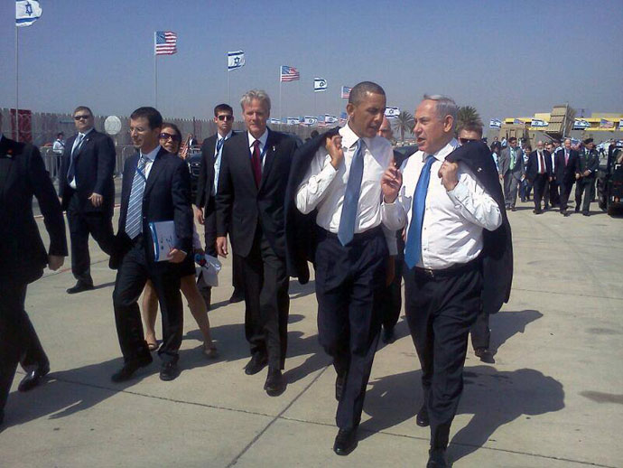 Obama and Netanyahu on the Ben Gurion tarmac. "Tweeters pointed out that when Obama took his jacket off, Netanyahu promptly mimicked the president. Everything seems well coordinated."(Photo from twitter.com user @netanyahu)