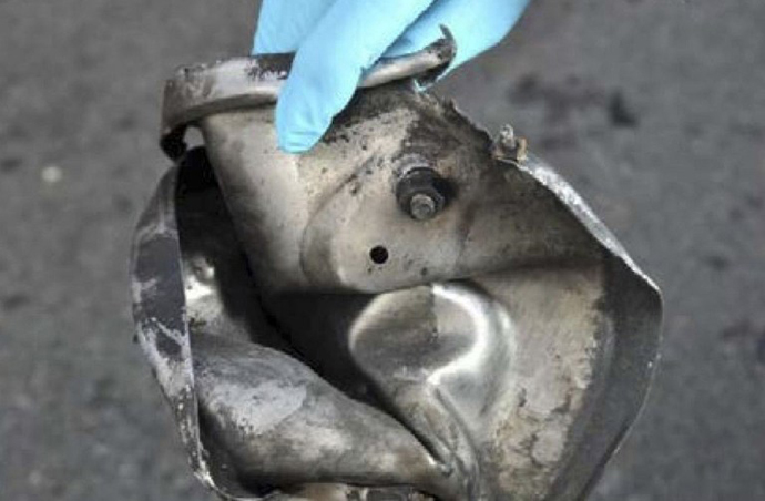 This photograph obtained April 16, 2013 courtesy of the Federal Bureau of Investigation (FBI) shows the remnants of a pressure cooker the FBI says was part of one of the bombs used during the Boston Marathon on April 15, 2013. (AFP Photo / FBI)
