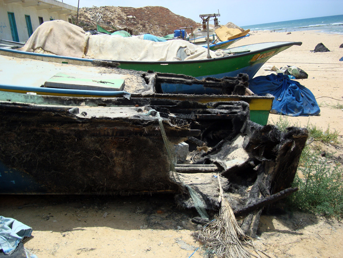 Wreckage of a Palestinian fishing boat destroyed by Israeli navy shelling. (Photo: Eva Bartlett/copyright RT)