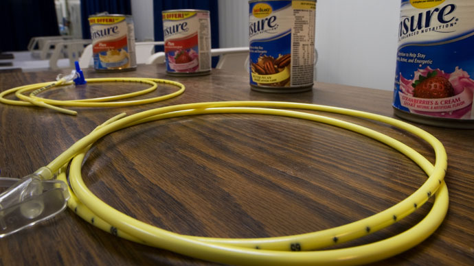 In this photo reviewed by US military officials, two feeding tubes and cans of Ensure with flavors such as Butter Pecan and Strawberries & Cream are seen inside the detainee hospital inside Camp Delta, part of the US Detention Center at Guantanamo Bay, Cuba.(AFP Photo / Paul J. Richards)