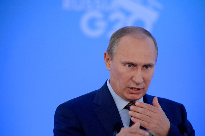 Russiaâs President Vladimir Putin gestures during a press conference at the end of the G20 summit on September 6, 2013 in Saint Petersburg (AFP Photo / Alexandr Nemenov)