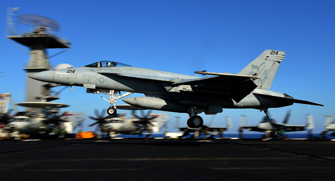 An F/A-18E Super Hornet takes off from the flight deck of the USS Nimitz (CVN 68) aircraft carrier in the Mediterranean Sea on October 24, 2013. The US aircraft carrier, which had been on standby in case of a flare up in Syria, has left the Red Sea for a brief stint in the Mediterranean Sea. (AFP Photo)