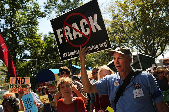 Anti-fracking activists demonstrate in lower Manhattan on September 21, 2013 in New York City. (AFP Photo / Spencer Platt)