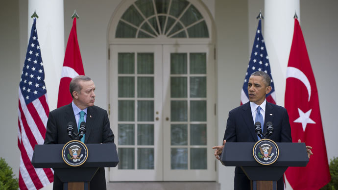 US President Barack Obama and Turkish Prime Minister Recep Erdogan hold a joint press conference in the Rose Garden of the White House in Washington, DC, May 16, 2013. AFP PHOTO / Saul LOEB 