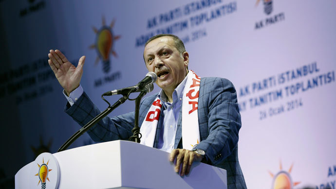 Turkey's Prime Minister Tayyip Erdogan addresses his supporters during a party meeting to announce AK Party candidates for the upcoming local elections in Istanbul January 26, 2014. REUTERS/Murad Sezer