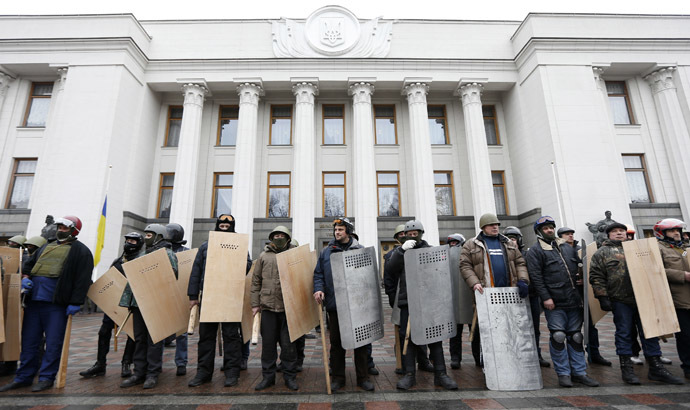 Anti-government protesters hold shields as they guard the Ukrainian Parliament building in Kiev February 22, 2014. (Reuters/Vasily Fedosenko)
