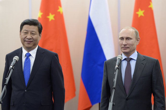 Russia's President Vladimir Putin (R) and his Chinese couterpart Xi Jinping (AFP Photo / RIA Novosti / Pool / Alexey Nikolsky) 