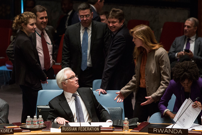 Samantha Power (R), the American ambassador to the United Nations talks to Russia's ambassador to the United Nations, Vitaly Churkin, before a vote regarding the Ukrainian crisis is taken at the U.N. Security Council in New York March 15, 2014 (Reuters / Andrew Kelly)