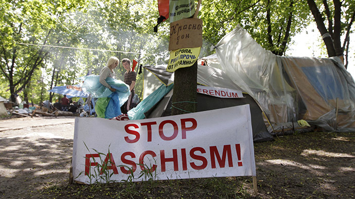 Activists are seen in a camp near the seized office of the SBU state security service in Luhansk, eastern Ukraine, May 3, 2014. (Reuters / Vasily Fedosenko)