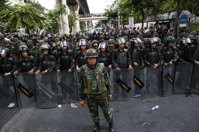 Thai soldiers stand guard as they block a street during a protest against military rule in central of Bangkok May 24, 2014. (Reuters)