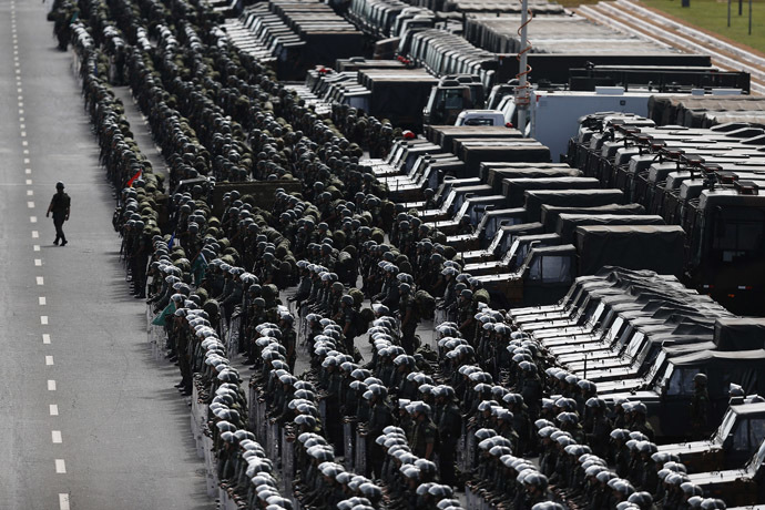 Members of the Brazilian Army, Navy and Air Force attend a presentation of Defence and Security personnel and equipment that will be used during the 2014 World Cup in Brasilia, June 8, 2014. (Reuters/Ueslei Marcelino)