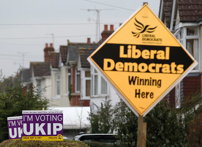 Political placards are displayed outside houses in Eastleigh, southern England (Reuters / Luke MacGregor)