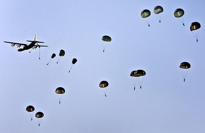 Parachutes are being dropped at Ginkel Heath in Ede, the Netherlands, on September 19, 2009. The activity is organised to mark the 65th anniversary of the Battle of Arnhem which was fought in and around the city of Arnhem from the 17â26 September 1944 (AFP Photo)