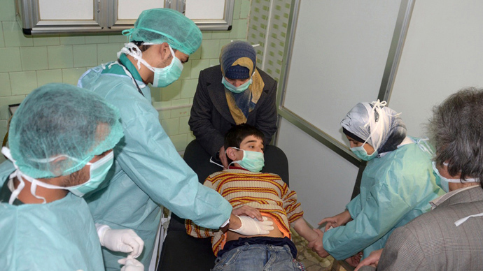 A boy, affected in what the government said was a chemical weapons attack, is treated at a hospital in the Syrian city of Aleppo March 19, 2013 (Reuters / George Ourfalian)