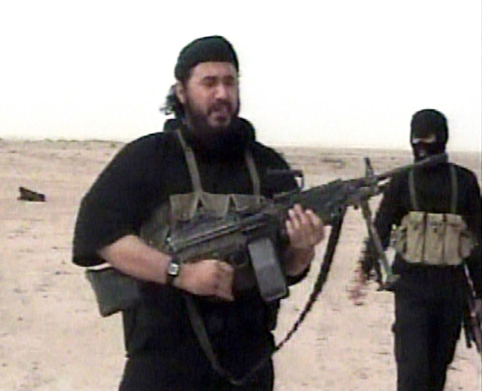 Abu Musab al-Zarqawi (L), leader of al Qaeda in Iraq, is seen in this video footage obtained by the Pentagon and released on May 4, 2006. (Reuters/Department of Defense/Handout)