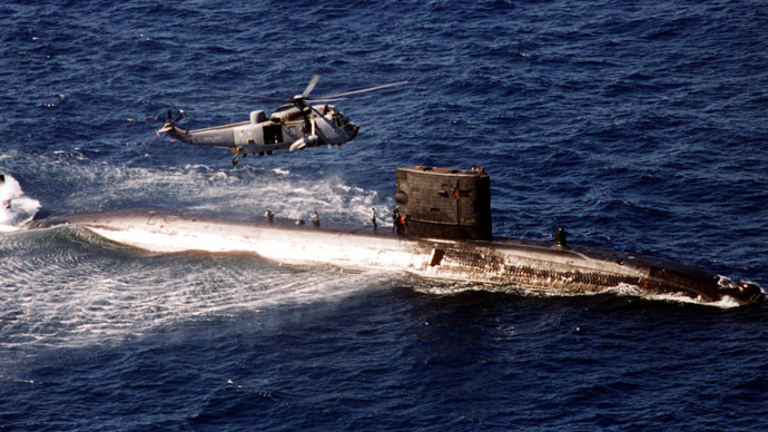 A Sea King helicopter from HMS Invincible meets nuclear powered Trafalgar class "hunter killer" submarine HMS Turbulent in the Ionian Sea (Reuters)