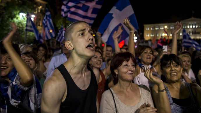 "No" supporters celebrate referendum results on a street in central in Athens, Greece July 5, 2015.(Reuters / Marko Djurica)
