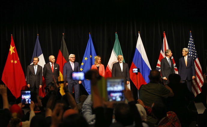 Chinese Foreign Minister Wang Yi, French Foreign Minister Laurent Fabius, German Foreign Minister Frank Walter Steinmeier, High Representative of the European Union for Foreign Affairs and Security Policy Federica Mogherini, Iranian Foreign Minister Mohammad Javad Zarif, British Foreign Secretary Philip Hammond and U.S. Secretary of State John Kerry (L-R) pose for a family picture after the last plenary session at the United Nations building in Vienna, Austria July 14, 2015. (Reuters)
