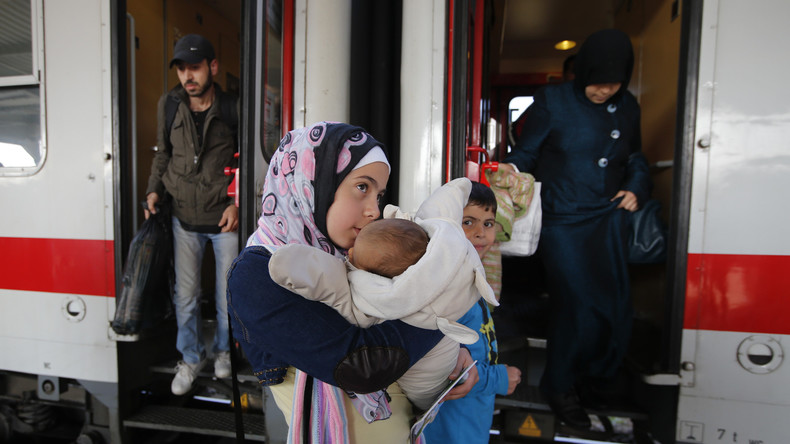 Près d'un million de migrants accueillis dans une Allemagne sous-tension