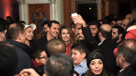 Bachar et Asma el-Assad en visite à l'église Notre-Dame de Damas