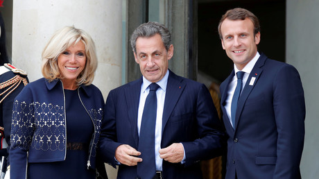 Nicolas Sarkozy et le couple Macron.