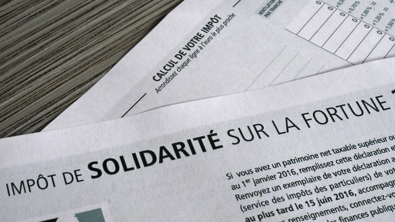 Une rencontre secrète à l’Elysée aurait décidé de la suppression immédiate de l’ISF