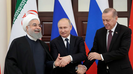 Hassan Rohani, Vladimir Poutine et Recep Tayyip Erdogan à Sotchi, le 14 février. 