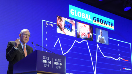 Angel Gurria, secrétaire général de l'OCDE, présente les perspectives économiques de l'OCDE au siège de l'OCDE à Paris, le 21 mai 2019.