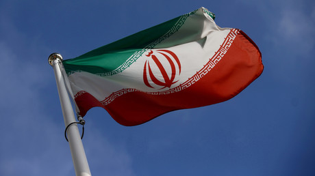 Le drapeau iranien flotte devant le siège de l'Agence internationale à l'énergie atomique (AIEA), le 1er mars 2021.