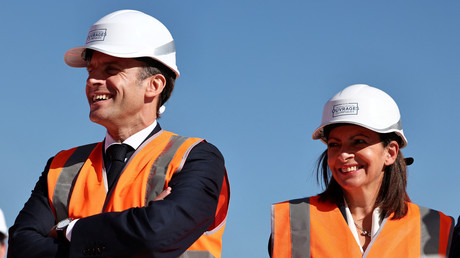 Emmanuel Macron et Anne Hidalgo visitent le chantier du village olympique des JO 2024 à Saint-Ouen (Seine-Saint-Denis), 14 octobre 2021 (image d'illustration).