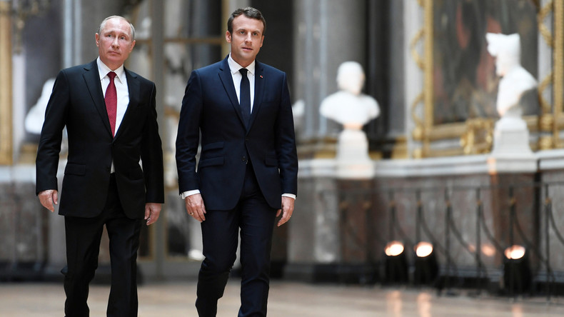 Poutine dit à Macron espérer que RT puisse travailler sans discrimination en France