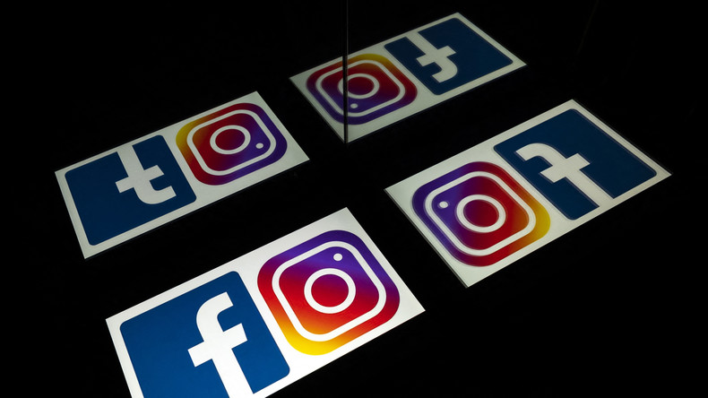Les logos des réseaux sociaux américains Facebook et Instagram sur les écrans d'une tablette et d'un téléphone portable (image d'illustration).