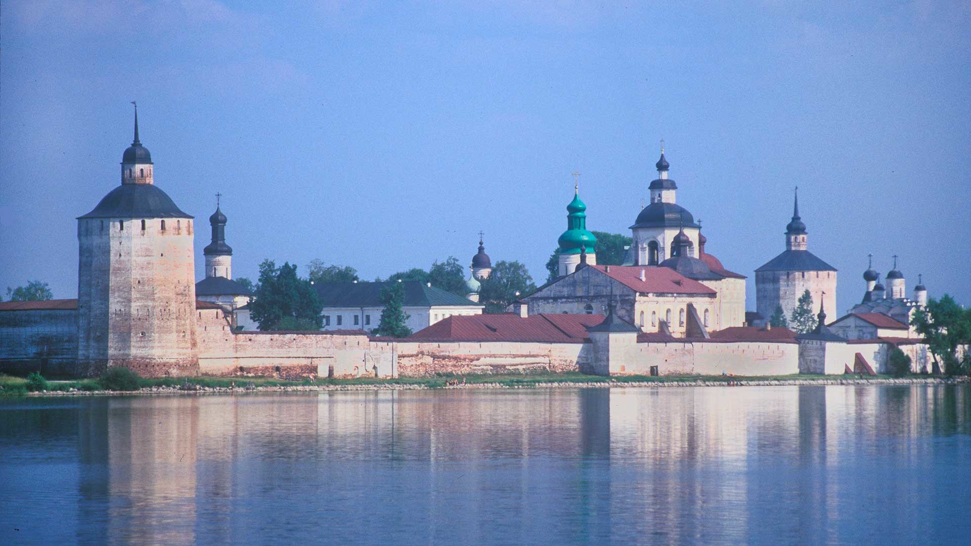From left: Belozersk Tower, Gate Church of St. John Climacus, Cathedral of Decapitation of John the Baptist (behind trees), Dormition Cathedral, Refectory Church of Presentation, Church of Archangel Gabriel, bell tower, Smithy Tower, Church of Transfiguration. July 15, 1999.
