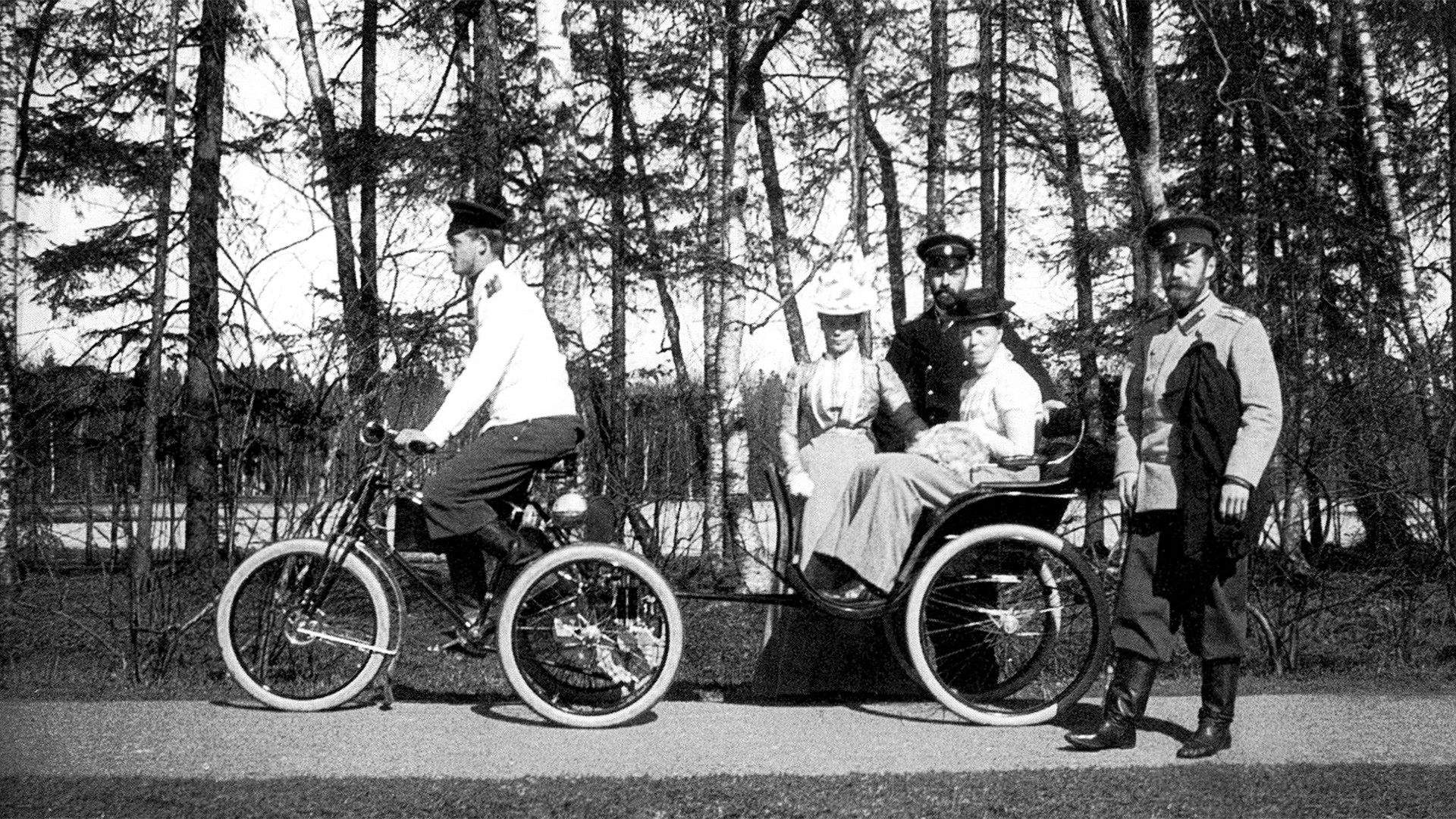  Emperor Nicholas II and his family enjoying an afternoon walk.