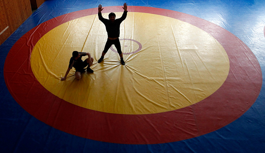 Freestyle wrestlers take part in a training session at a sport base in Makhachkala