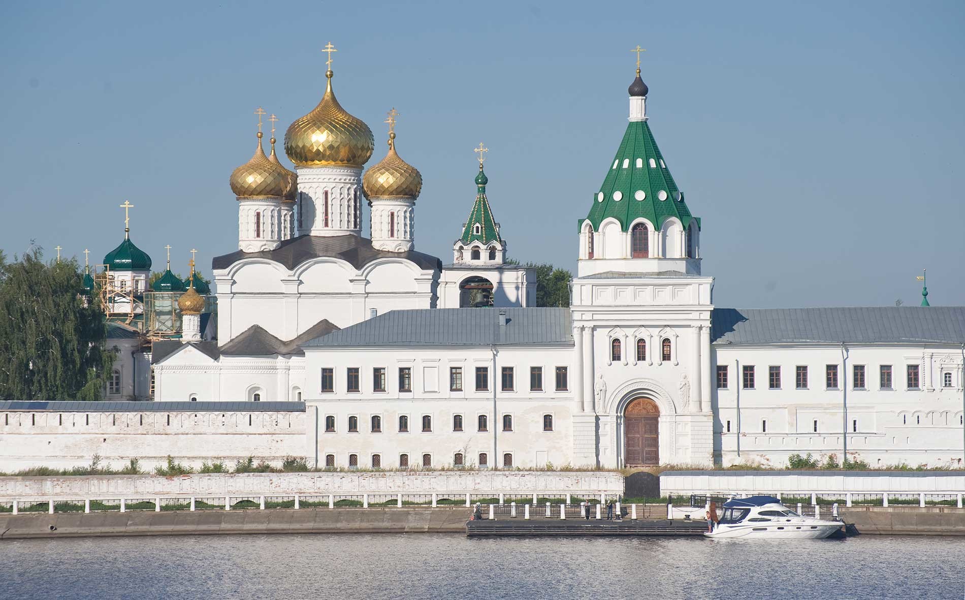 Trinity-Ipatiev Monastery, east view across Kostroma River. From left: Cathedral of Nativity of the Virgin; Trinity Cathedral; bell tower; Archbishop's Cloisters with Gate Church of Sts. Chrysanthus & Daria. Aug. 13, 2017.