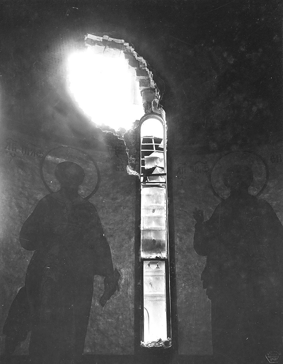 Holes penetrating the central walls of Assumption Cathedral after the bombardment of the Moscow Kremlin. View from the tower. Photograph by P.P. Pavlov. Nov. 5-7, 1917.