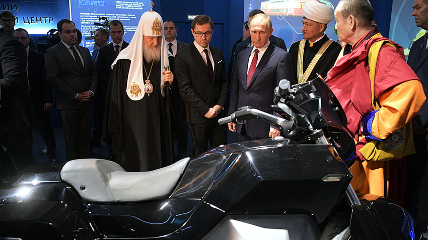 Vladimir Putin during his visit to Russia Focused on the Future multimedia exhibition and forum at the Manezh Central Exhibition Hall in Moscow