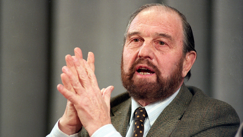 George Blake gestures during a news conference in Moscow on January 15, 1992