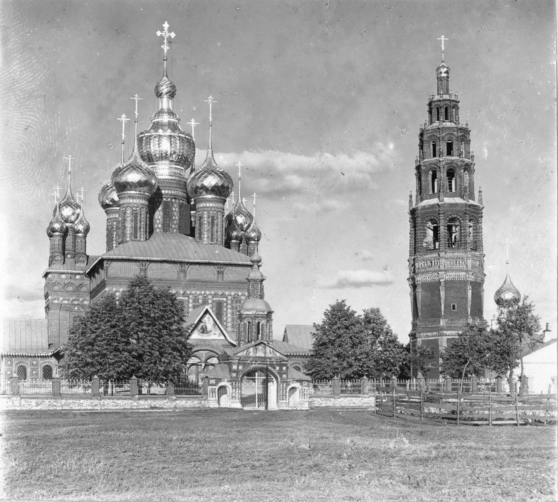 Church of Decapitation of John the Baptist, with bell tower. West view. Right: Ascension Church (not extant). Summer 1910.