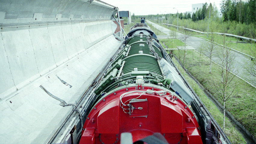 Russia's military spending has been slashed putting its weaponized train plans in jeopardy. 