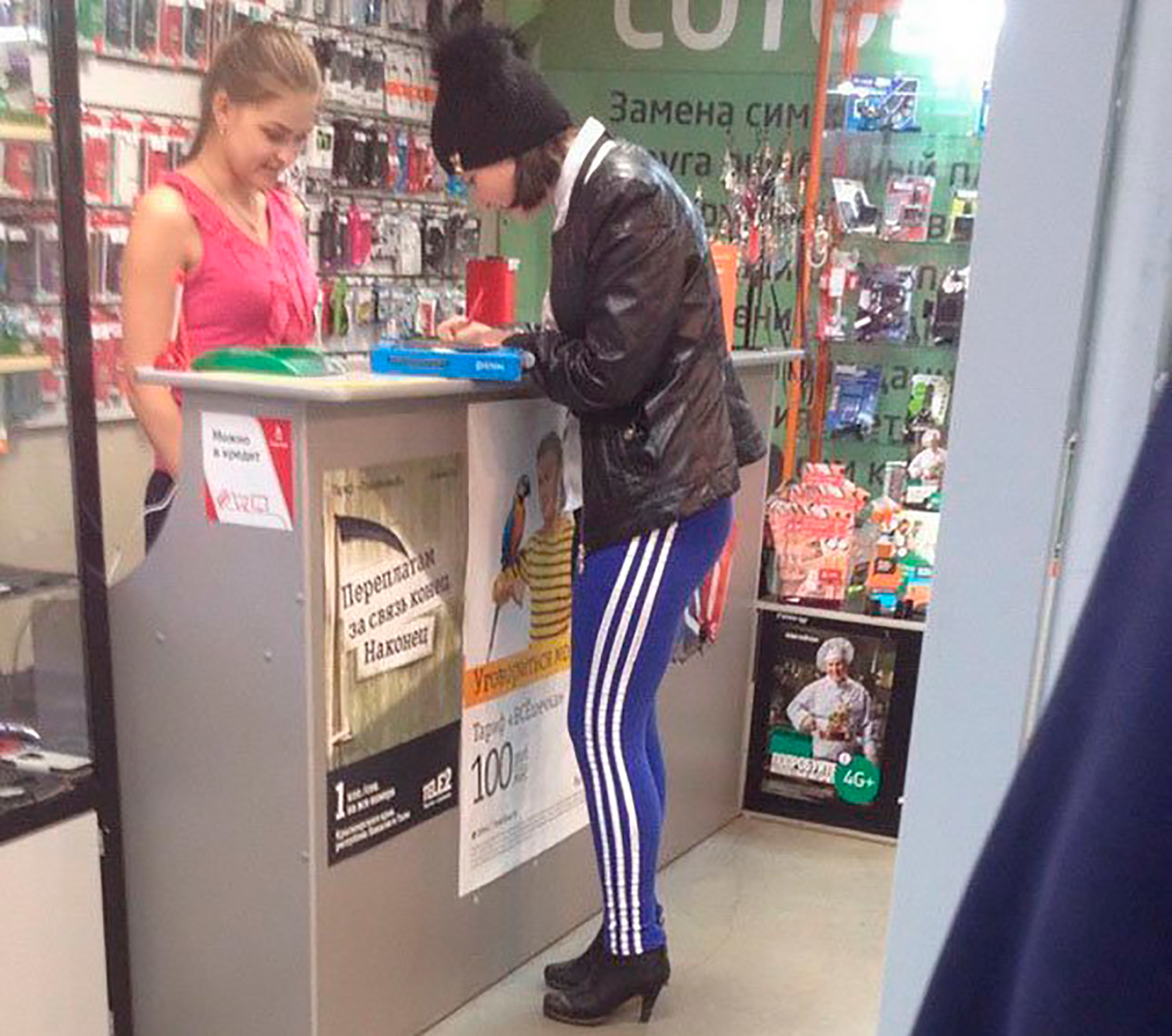 Sometimes Adidas goes even with high heels. (In fact, it doesn't at all but who cares, it's Russia).